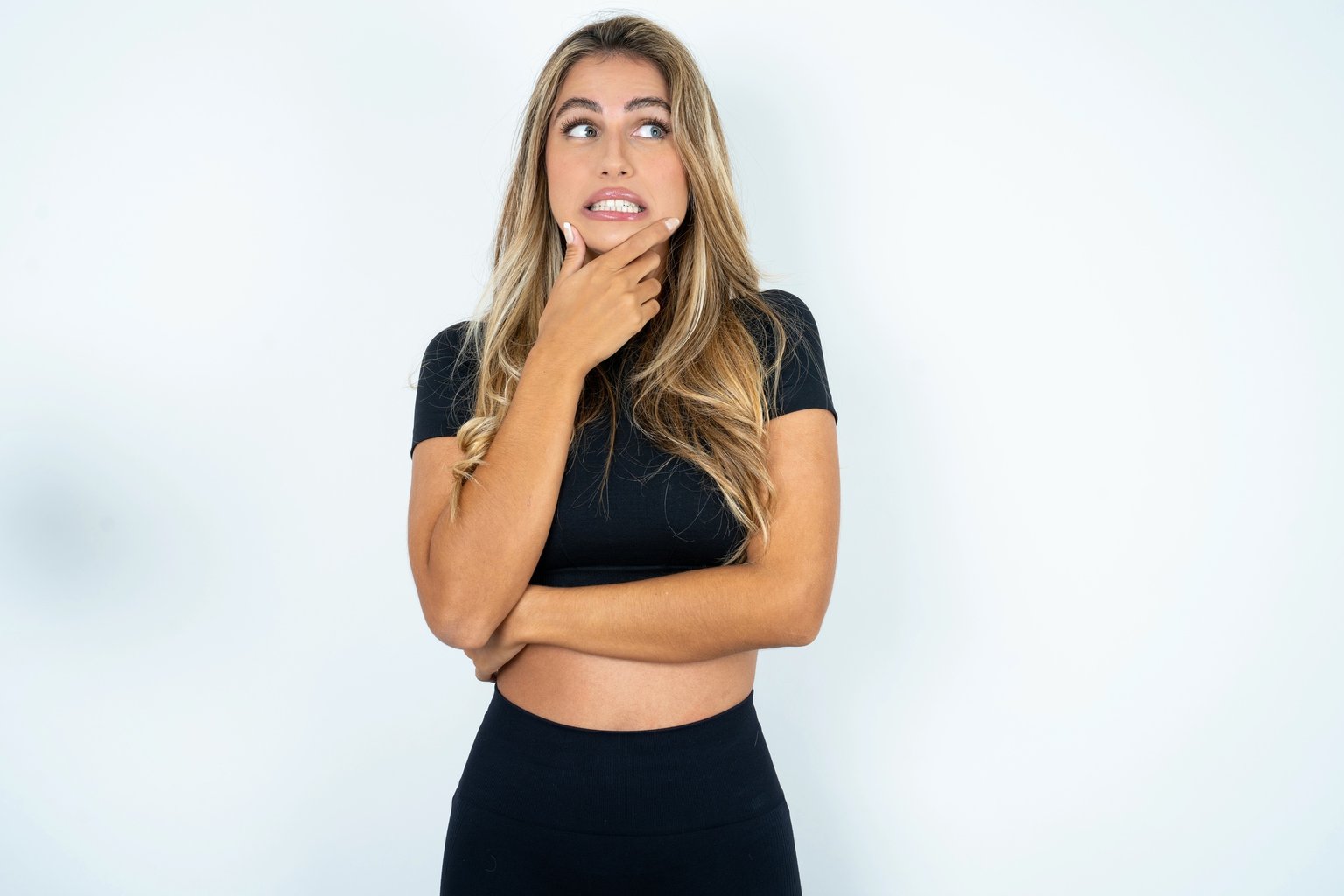 A woman thinking before her first strength-training session