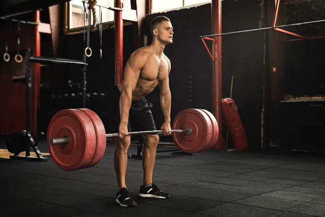 Athlete performing a heavy deadlift