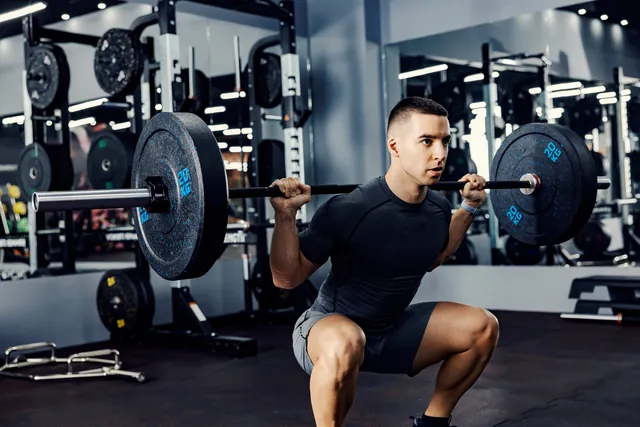 Athlete performing a heavy barbell deadlift